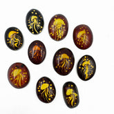 Cherry Amber Engraved Medusa Oval Shape Cabochons
